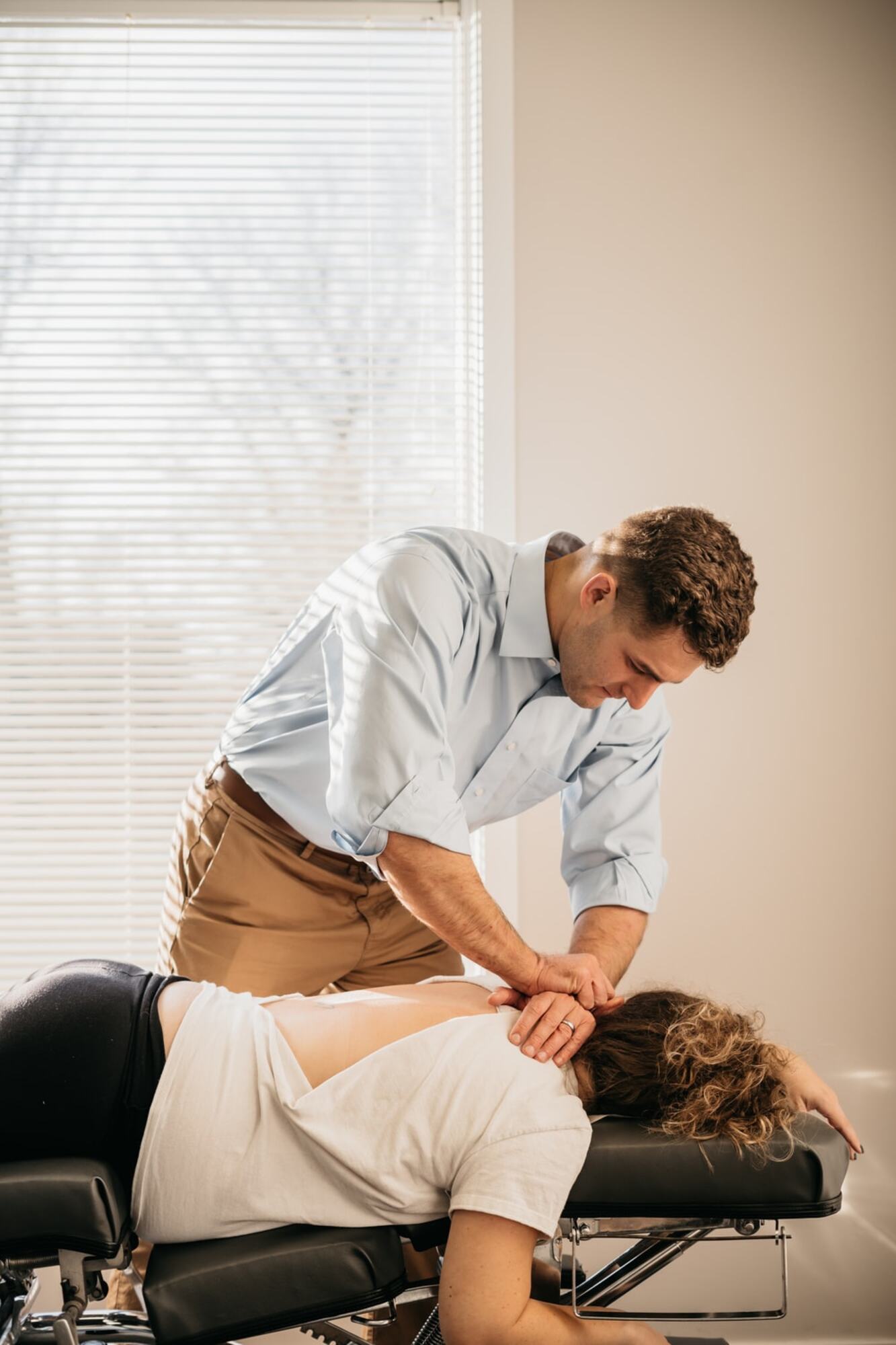 Dr. Mueller adjusting a patient